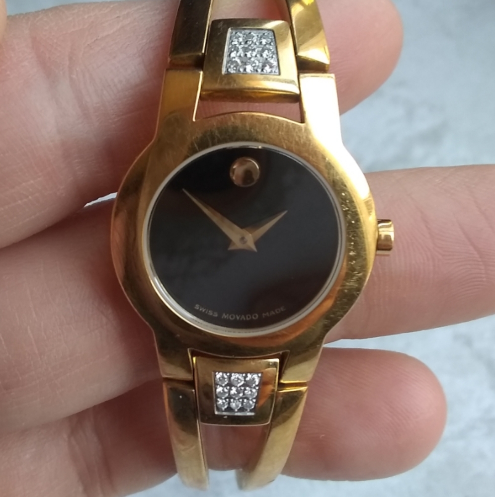 Movado yellow gold bangle watch with diamonds